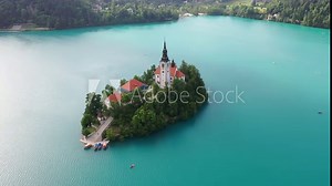 lake bled drone aerial Pilgrimage Church of the Assumption of Mary In . Bled Island In Slovenia With bled Castle Museum On Precipice And Rocky Mountain 4k Footage raw summer Virgin Mary