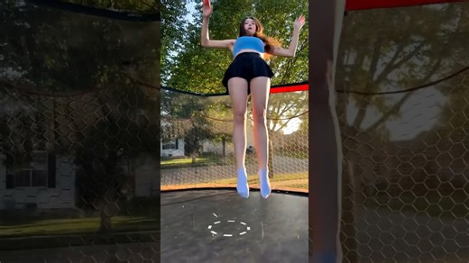 Model bounces higher during trampoline jump practice session