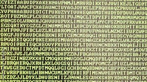 flashing random letters on the computer monitor with various colors that change quickly