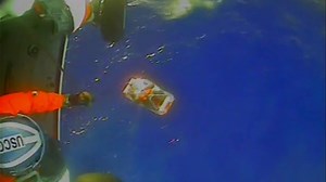 4 saved from ship sinking amid 'catastrophic flooding', USCG says