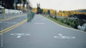 A footpath on a city street. Transport infrastructure, marking line and icon on asphalt. A track, route or path for pedestrians on a road