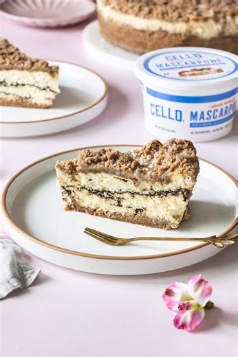 74 reactions · 3 comments | Why choose between coffee cake and cheesecake when you can have both? This Coffee Cake Cheesecake blends the nostalgic comfort of cinnamon crumb topping with the rich, creamy decadence of cheesecake all thanks to our Cello Mascarpone Cheese. All that’s missing is a cup of hot coffee. ☕️ From crumble to creamy perfection, get the how-to on our website. https://www.cellocheese.com/recipes/coffee-cake-cheesecake/ | Cello Cheese | Facebook