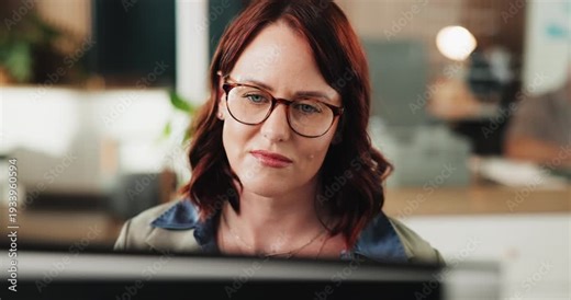 Woman, developer and reading with computer in office for research, software manual and coding. Female person, programming and troubleshooting server with pc, website maintenance and debugging system