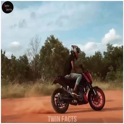 Motorcycle Wheelie Stunt by Twin Facts Riders