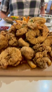 Smallish fish filet, sauce on side…. Or the massive fried fishermen’s platter of oysters, fish tips, shrimp etc with fries? There is only one correct answer… size matters my friends. But indulge me, what’s your choice going to be? | Andrew Zimmern