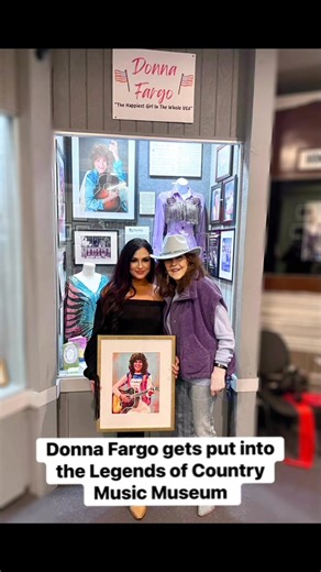 Celebrated Donna Fargo at her ribbon cutting for her new case at the Legends of Country Music Museum💜 This photo is of me giving her a copy of a painting I did of her. Another copy will hang in the museum. My grandmother, Dottie West recorded a song Donna wrote titled “Does it Matter” in 1974 on the House of Love album. # #DonnaFargo #CountryMusicLegend #HappiestGirlInTheWholeUSA #ClassicCountry #LegendsOfCountryMusicMuseum #TessFrizzellArt | Tess Frizzell