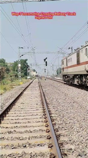 Wap-7 Locomotive Crossing Railway Track Change Signal Post