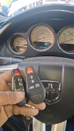 Al SHOKAN CAR KEY AND CAR STEREO on Instagram: "Smart key fob program dodge challenger key#carkey#carstero#dash#caraccerise"