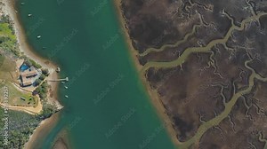 Water flows through deposited sediment on meandering river