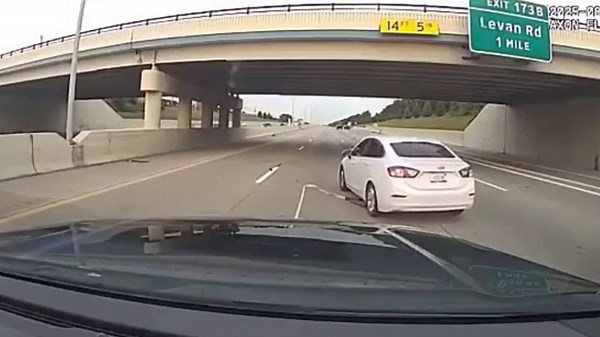 Moment stolen car’s axle is ripped off after repeated attempts to escape tire grappler