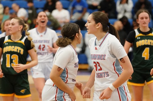 Why are Shawnee Heights basketball players wearing Bob Wells tattoos?