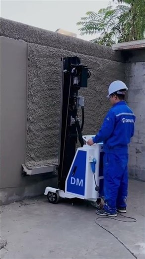 plastering process on walls using a plastering machine