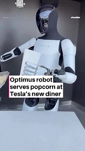 Optimus robot serves popcorn at Tesla’s diner