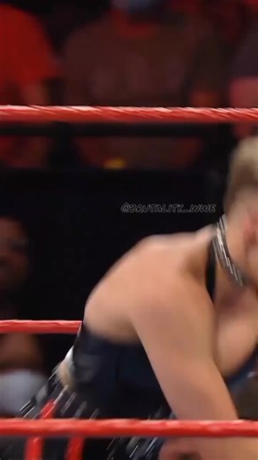 Exciting Female Wrestling Match Featuring Unique Costumes