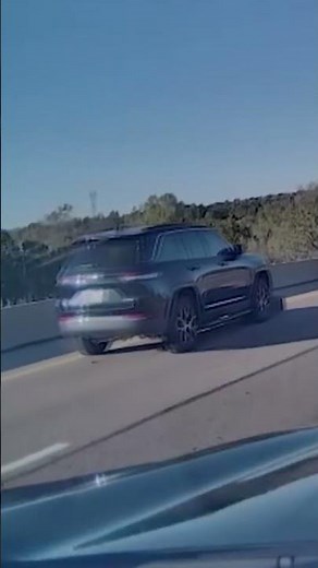 Tire goes flying off semi, rolls into car on highway