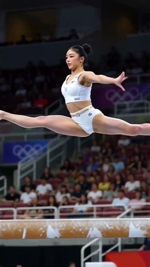 An athlete showcasing her routine on the balance beam #AIGymnastics #OlympicGymnastics