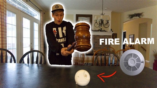 Heavy sledgehammer smashes through fire alarm during destructive test