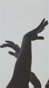 Contemporary dancers hands on a light background - Free Stock Video