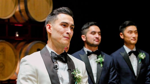 Groom can't stop crying after seeing his bride.