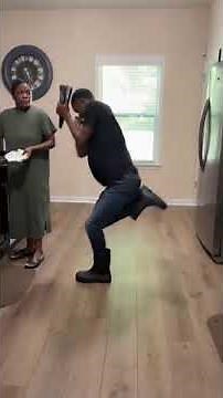 Fan Man Interrupts Mom's Cooking