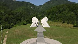 Tjentiste WWII Memorial, Sutjeska National Park, Republika Srpska, Bosnia and Herzegovina. Drone Aerial View of Monument in Green Landscape