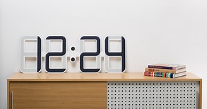 clock one by twelve24 measures a meter-wide and features e-ink display