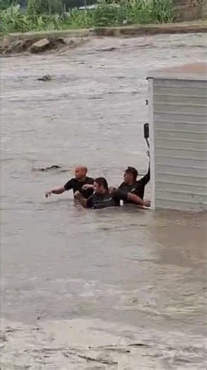 Truck Submerged in Guanare River During Flood