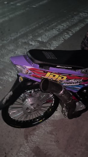 Exploring a Stylish Purple and Black Motor Scooter