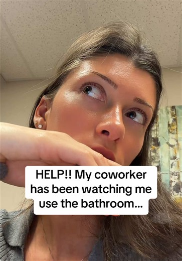 Coworker watching me in bathroom — should I report it?
