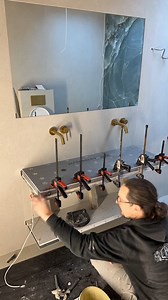 Bespoke floating worktops - made from tile to match the tiling in the room. Tiled from XXL onyx slabs & bonded with @elita_labs All materials from @protilertools (premtool boards, benfer adhesive) #tile #tiling #tiles #tiler #tileart #tilestyle #bathroom #bathroomgoals #bathroomdecor #homedecor #decor | HH Tiling
