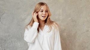 clip-1085290976-beautiful-girl-white-shirt-dancing-indoors-dances