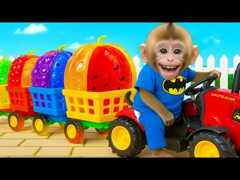 Macaco BONBON dirige um trator carregando frutas arco-íris superdivertidas.