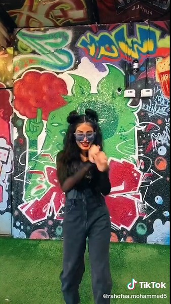 Colorful Urban Graffiti: Fashion and Fun Poses