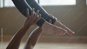 Partner Yoga performance done by two professional instructors