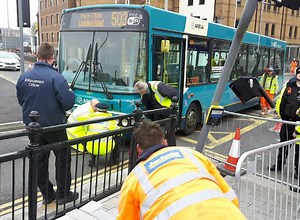 Woman injured in bus crash
