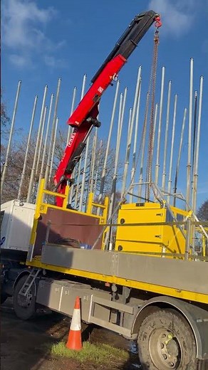 “Setting up a Hiab crane lift with chains”