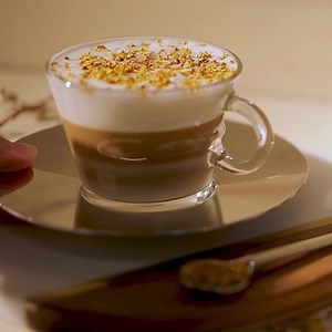 Enjoy an easy cappuccino at work with Nespresso Momento. Begin your workday in good spirits with quality coffee. | Nespresso