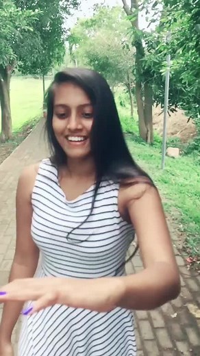 Captivating Outdoor Stroll in Stylish Dress