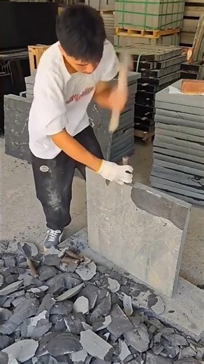 The process of cutting stone with a chisel