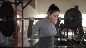 Woman Doing Squats Exercise Barbell Female Stock Footage Video (100% Royalty-free) 3423593697 | Shutterstock