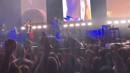 Canadians celebrate with national anthem at concert after hockey win against USA