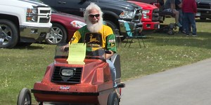Vintage snowmobiles on display in Lowville