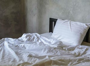 Young woman lugs mattress around to protest inaction in rape case