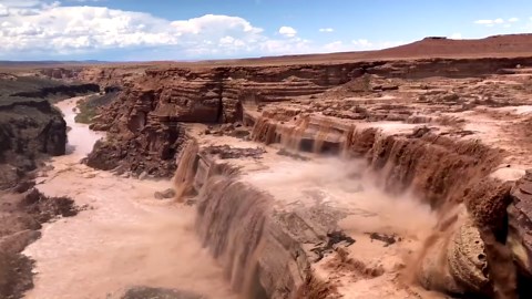Water gushes down Arizona's Grand Falls after monsoon rains