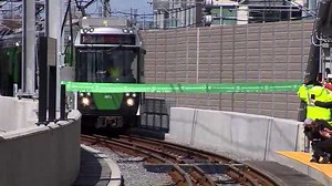 Green Line train rolls into new Lechmere Station
