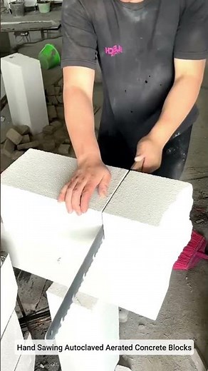 Hand Sawing Autoclaved Aerated Concrete Blocks