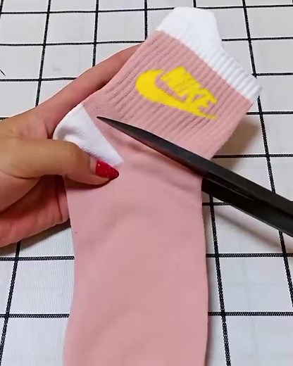 Creative Sock DIY: Customizing a Pink Sock with Nike Logo