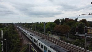 Beautiful Aerial and Close up View of Train Moving on Tracks