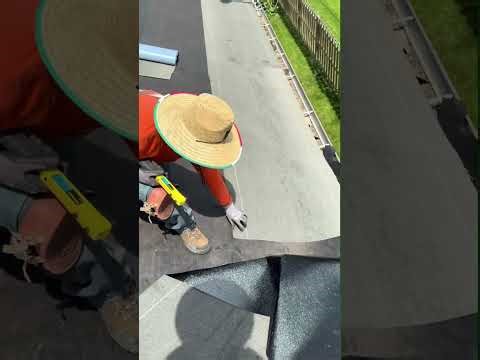 Ridge cap on a shingle roof