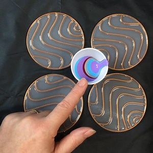 These acrylic ripple pour coasters turned out pretty awesome! Love this new wave template! #mixedmediaart #acrylicpouring #acrylicpouringart #acrylicpouringpainting | Pour Away Fluid Arts
